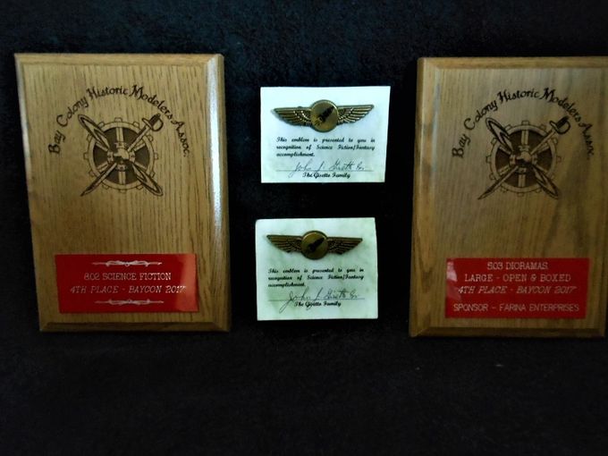 I won two Fourth Place awards and two pins for Achievement in Science Fiction and Fantasy at the 2017 Baycon show in November. The plaques were for 