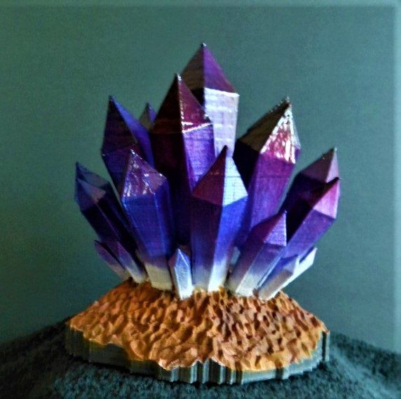 This photo obviously has nothing to do with King Kong but it is a 3D print of some crystals that I finished the other day. It was printed using white material and I did the paint job to resemble amethyst. I include here just to give folks and idea what you can do with one of these printers. This object is about 7 inches tall.