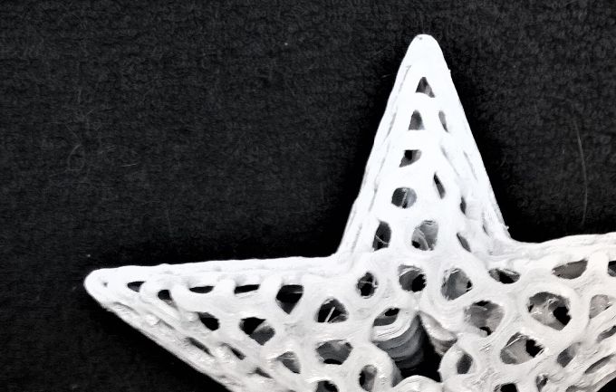 Two voronoi star fish. The smaller star fish on the right is the actual 'recipe' measuring about four inches across. The one of the left is a larger and flatter version which illustrates the ability one has in 3D printing that allow the user to alter and objects size & dimensions as they like, the only limitation in size being that of the 3D printer itself.